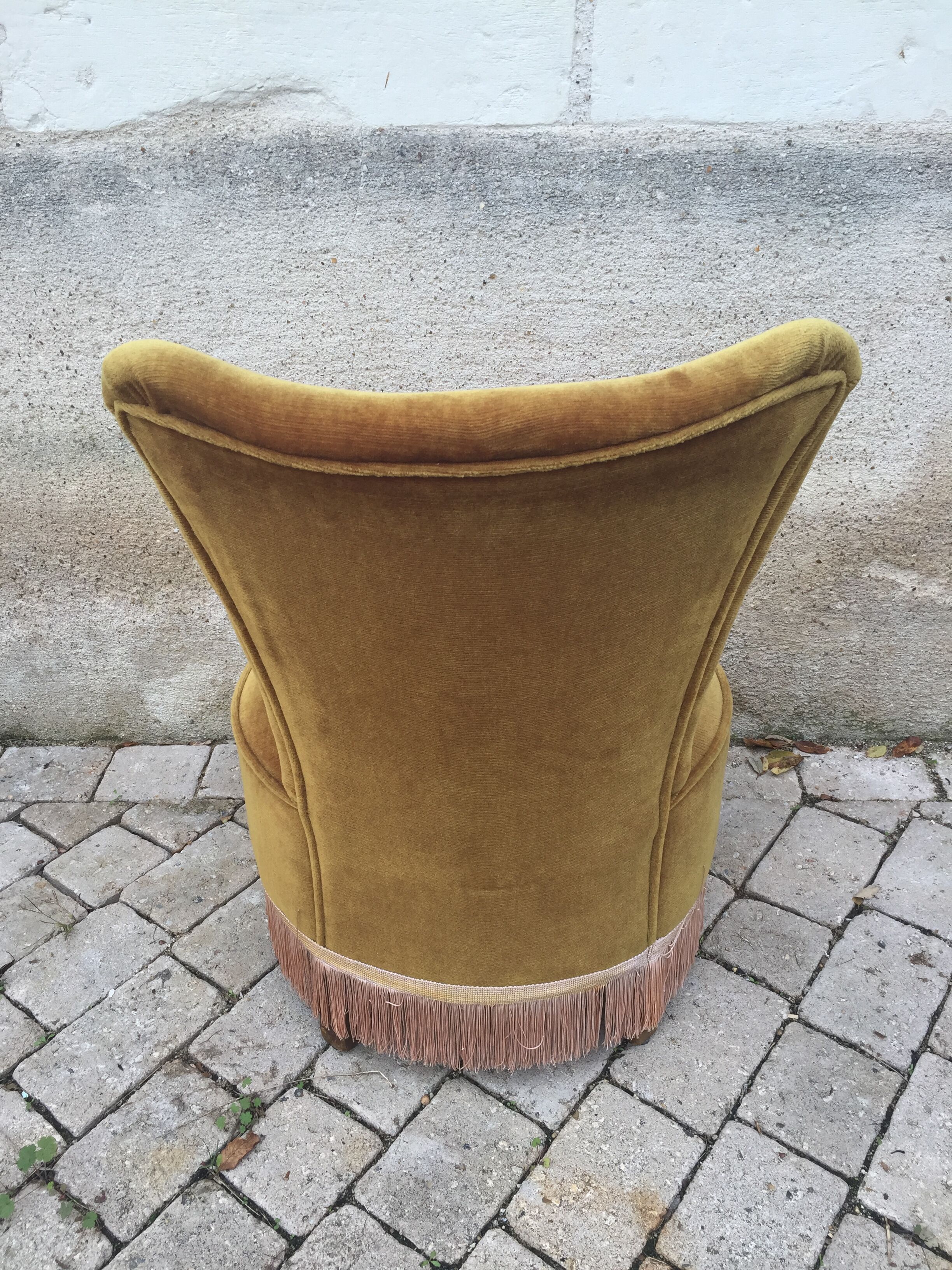 Fauteuil crapaud velour et frange