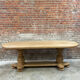 Massive oval monastery table in bleached oak with turned legs.
