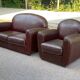 Burgundy brown leather living room sofa and club chair