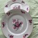 Set of 4 flat plates, in art deco porcelain