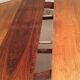 Scandinavian round table in rosewood veneer
