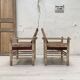 Pair of wooden armchairs and ropes