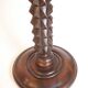 Wooden pedestal table with spiked columns