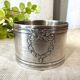 White metal napkin ring
