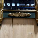 Empire-style mirror in gilded wood