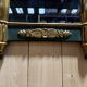 Empire-style mirror in gilded wood