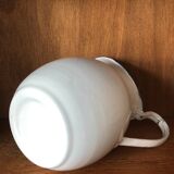 Enamelled plate pitcher