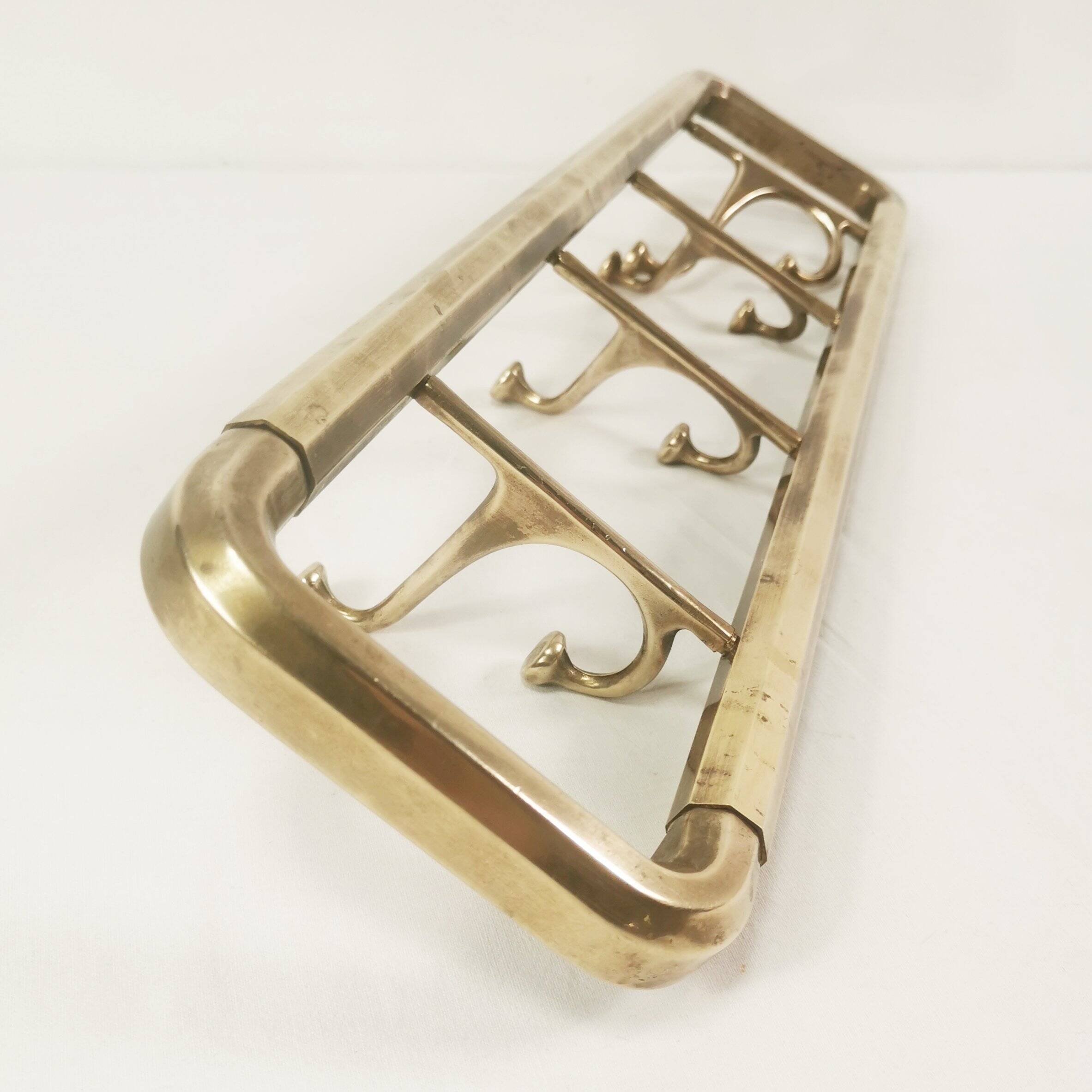 Art Deco brass wall hanger, Austria, 1940s.