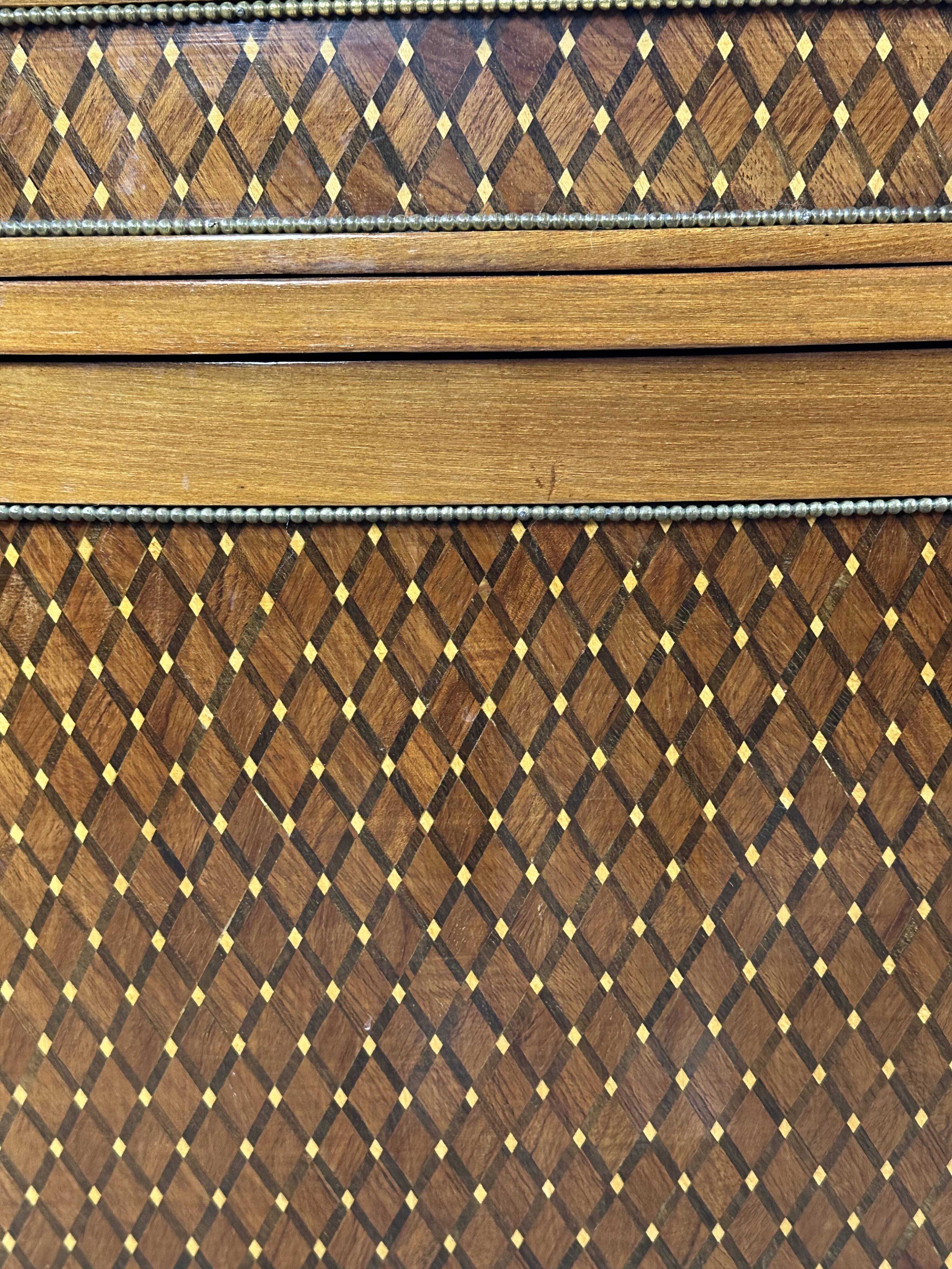 Half-moon commode in the Louis XVI style