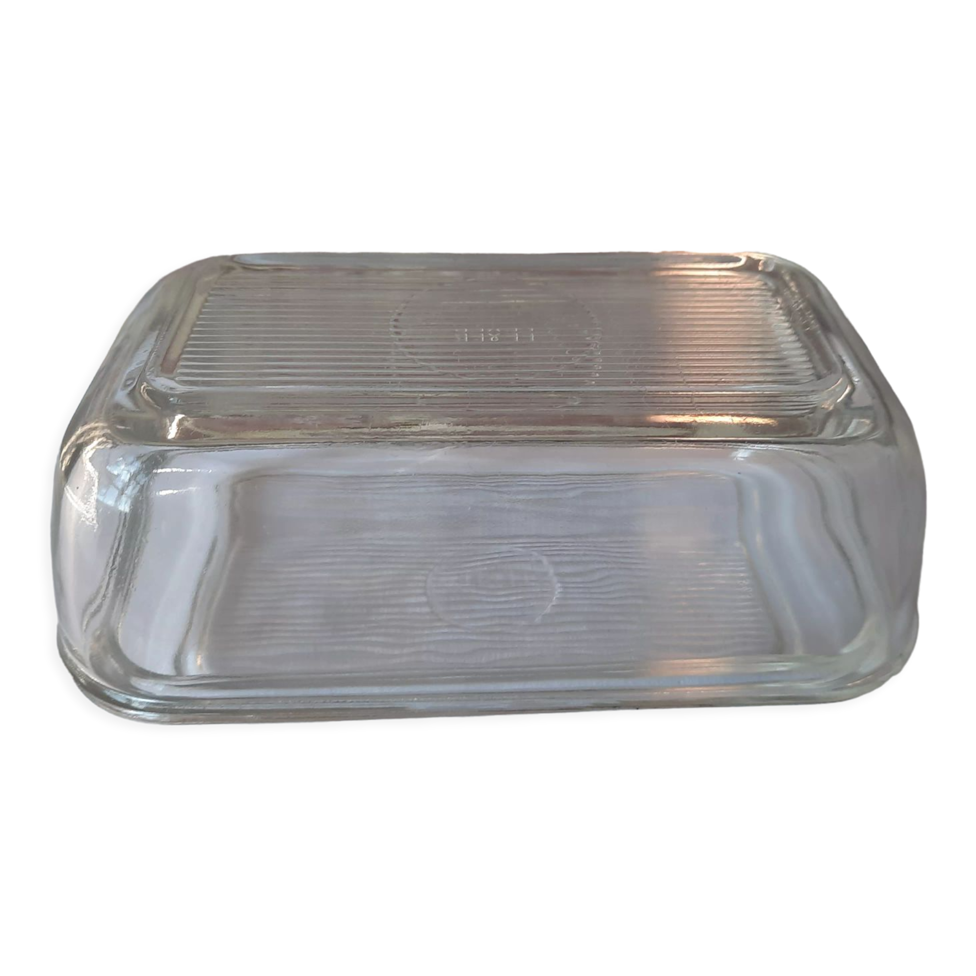 Transparent glass butter dish from lever