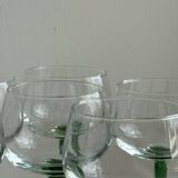 8 Alsatian stemmed glasses, transparent glass and green stems.