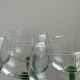 8 Alsatian stemmed glasses, transparent glass and green stems.