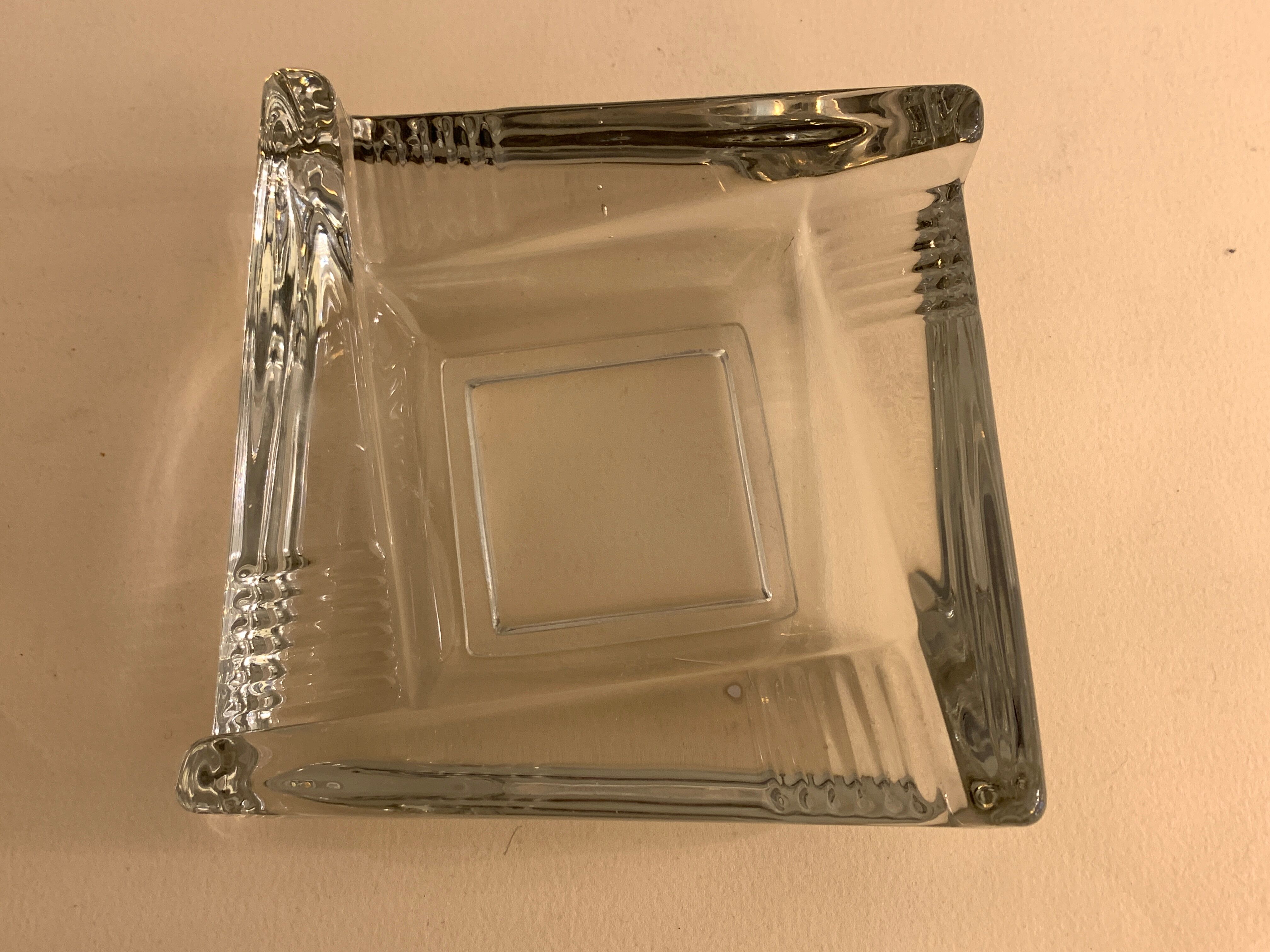 Transparent moulded glass ashtray