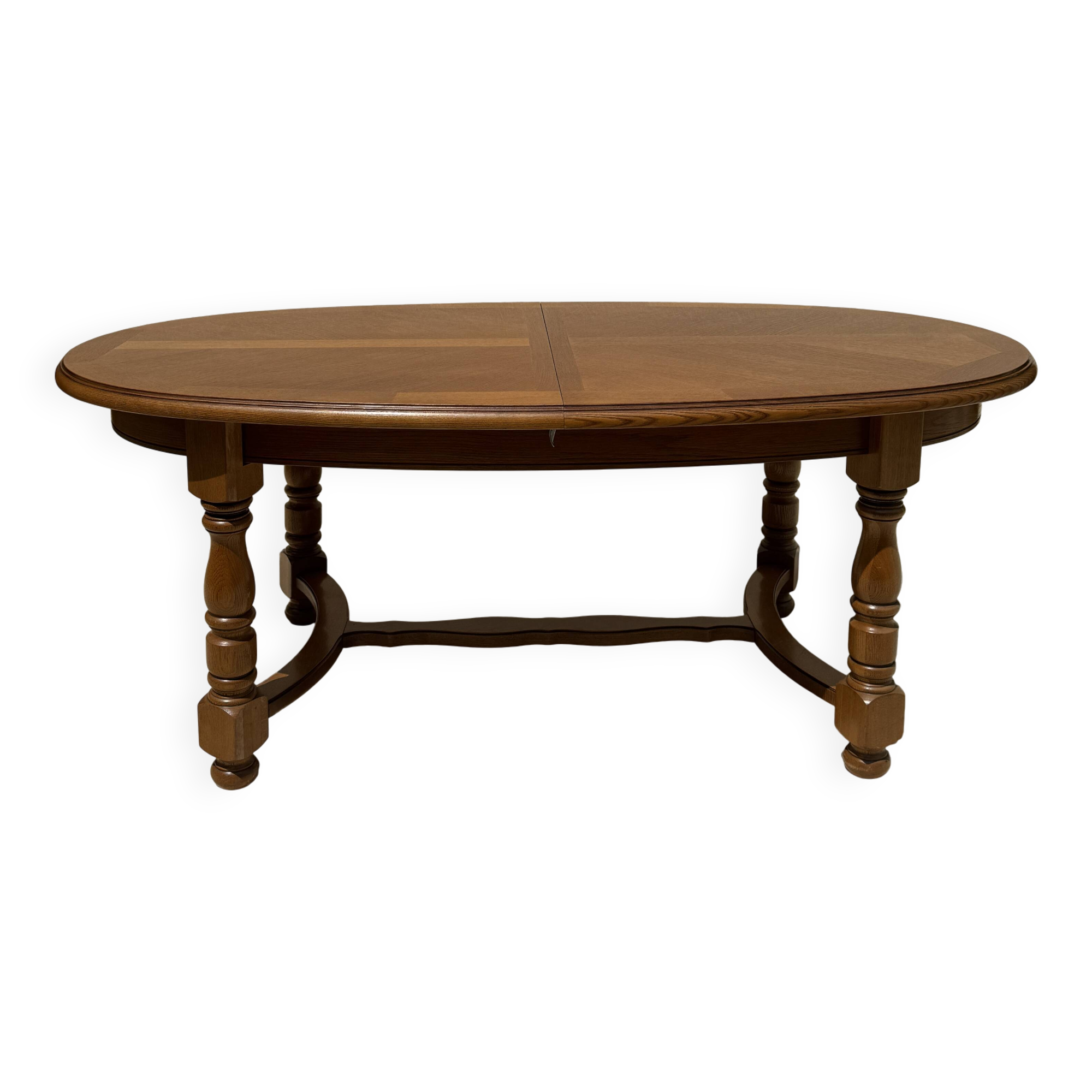 Oak dining table, oval living room table with two extensions.