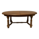 Oak dining table, oval living room table with two extensions.