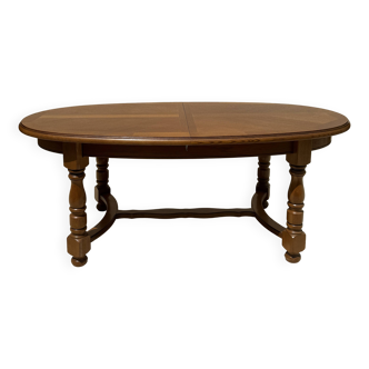 Oval oak dining room table with two extensions