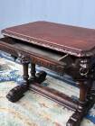 Ancient Flemish Gothic desk. Solid oak with richly carved dolphins.