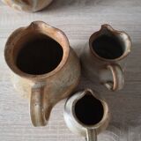 Lot of 4 pitchers in sandstone