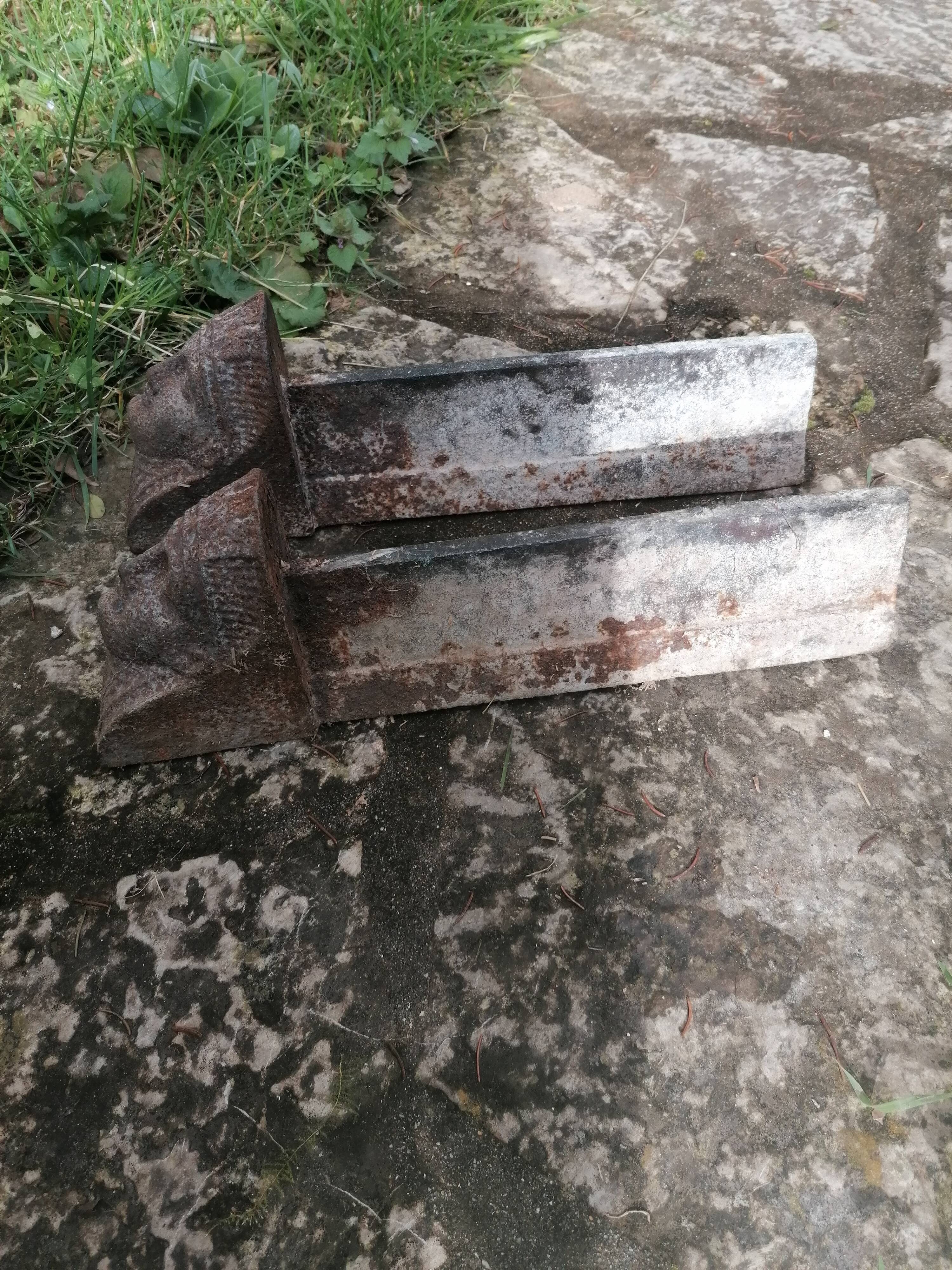 pair of andirons with sphinx heads