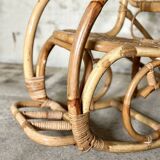 Rocking-chair en rotin et cannage