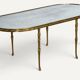 Maison Baguès coffee table in gilded bronze and aged mirror – 1950s