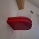 Red metal globe wall light