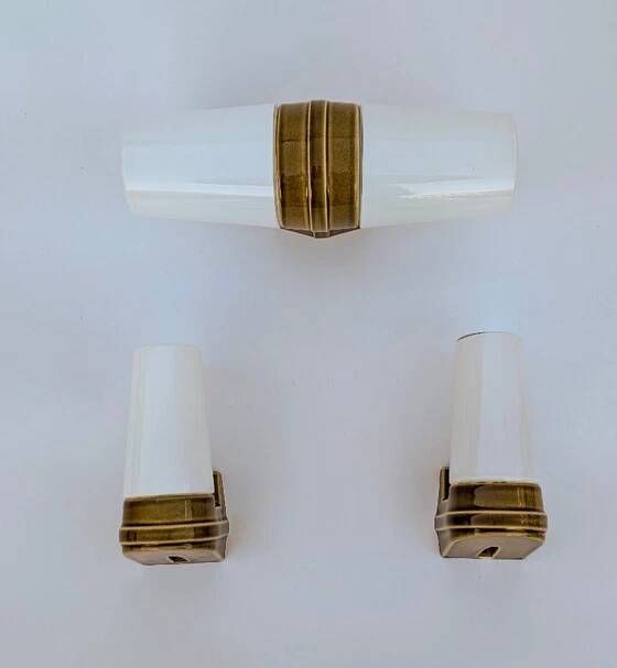 3 ochre porcelain wall sconces from the 1960s (models 6065 and 6080) by Sigvard Bernadotte for Ifö.