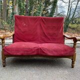 Canapé vintage 2 places en bois massif et velours bordeaux du 20ème