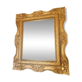 Grand miroir en bois doré