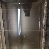 Chromed metal coffee table with smoked glass top from the 70s