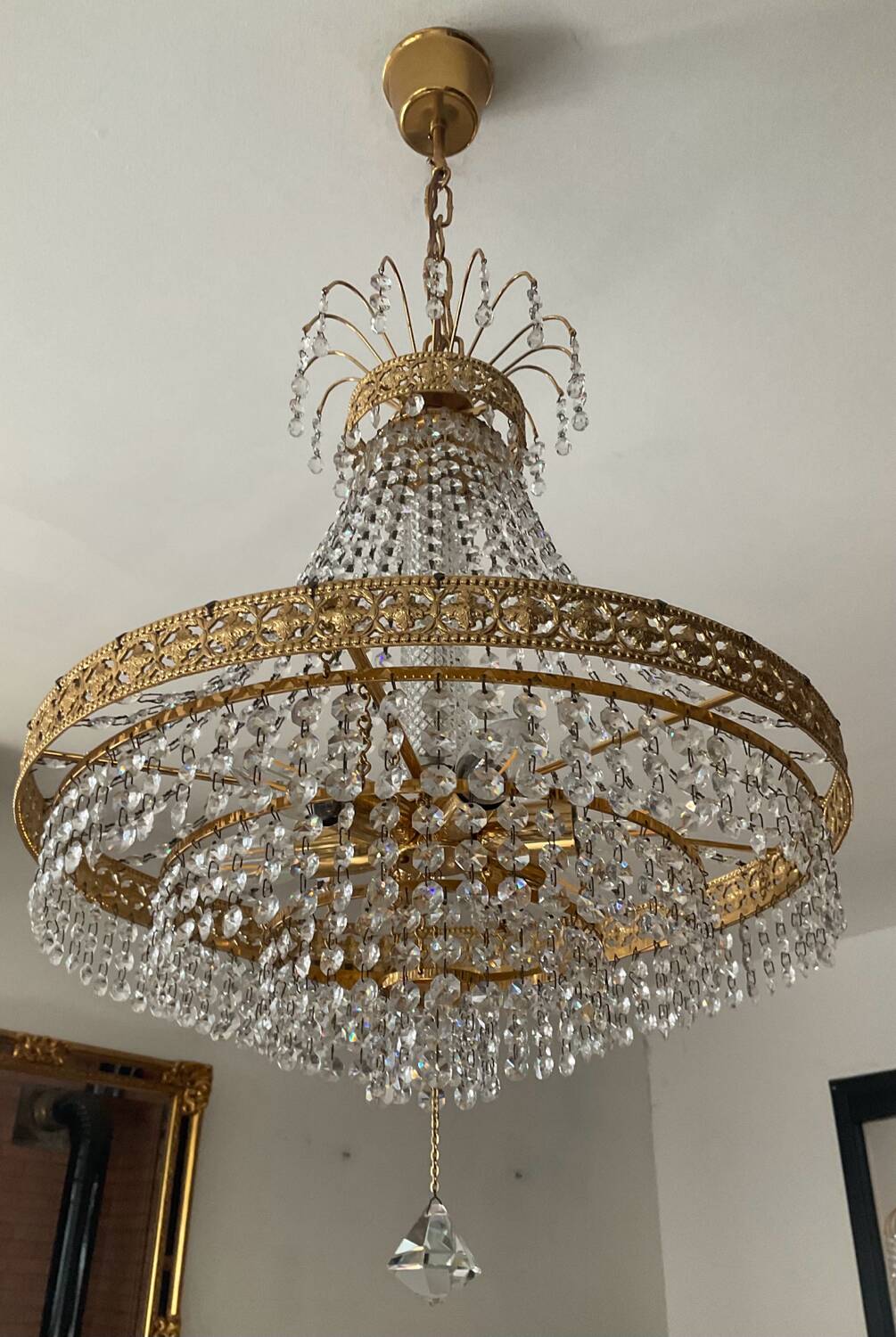 Brass hot air balloon chandelier with cascade of tassels