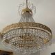 Brass hot air balloon chandelier with cascade of tassels