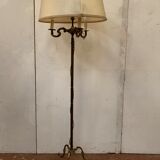 Floor lamp has three brass light arms