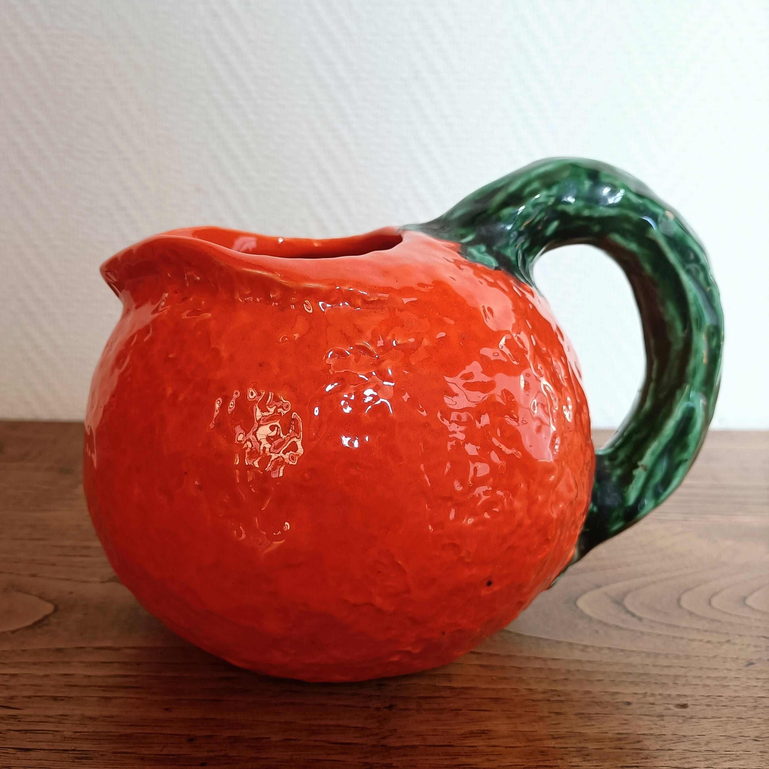 Orange pitcher in Corsican slip