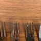 Set of 10+1 Japanese stainless steel dessert forks, rose pattern, 1970