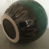 Green earthenware vase base with black flame decoration