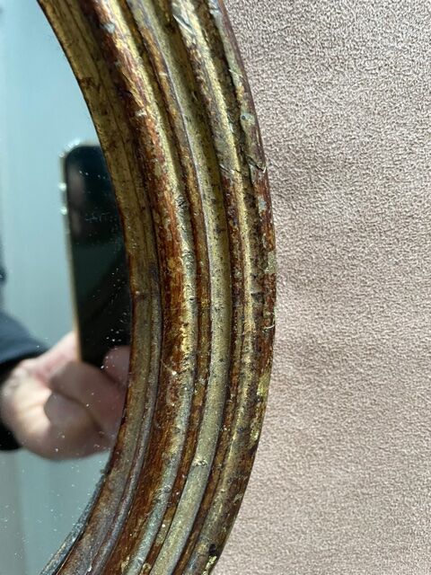 Old mirror in gilded wood early twentieth century
