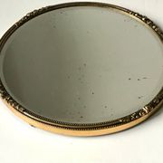 Miroir biseauté antique avec cadre en métal doré