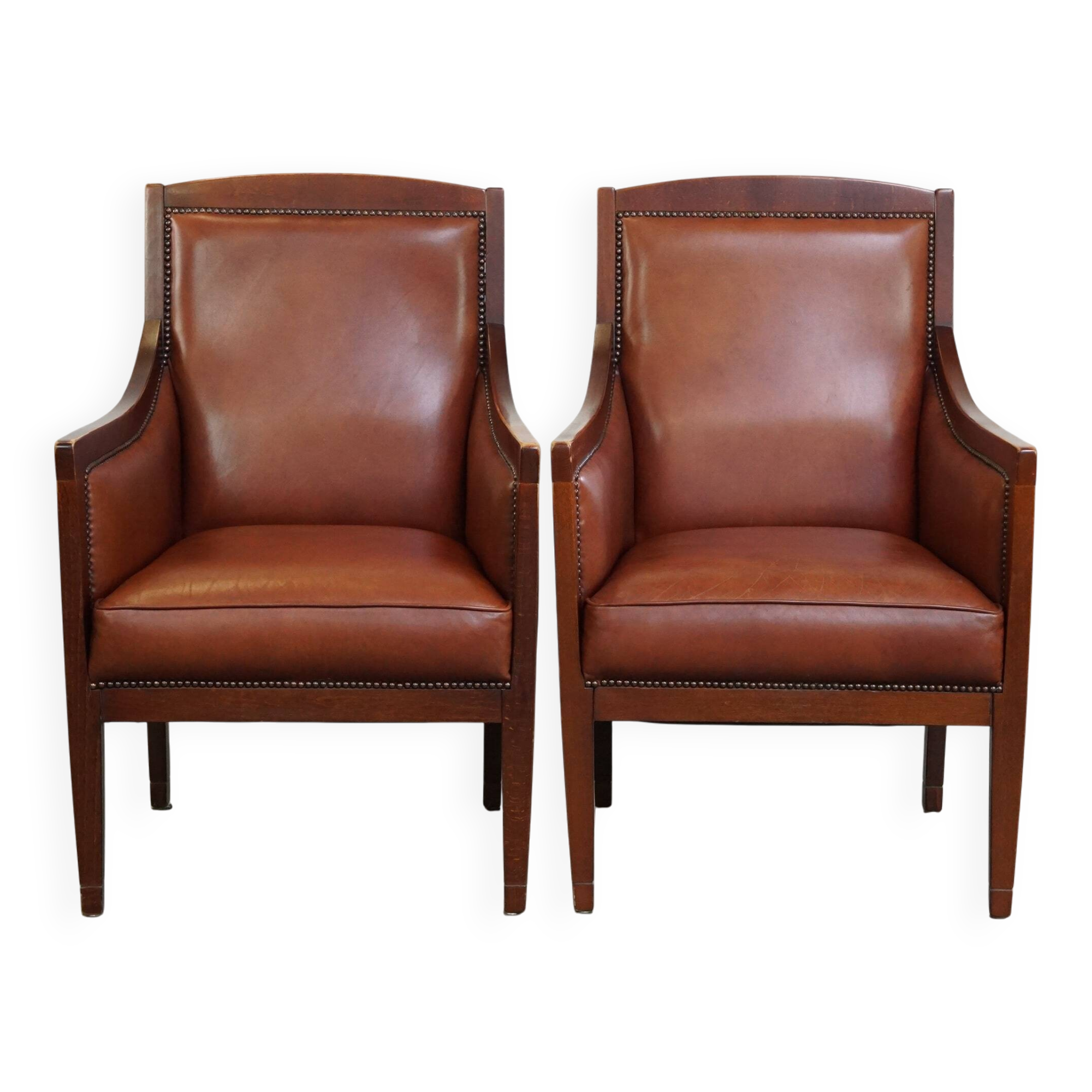Set of 2 cognac-colored cowhide Art Deco design armchairs