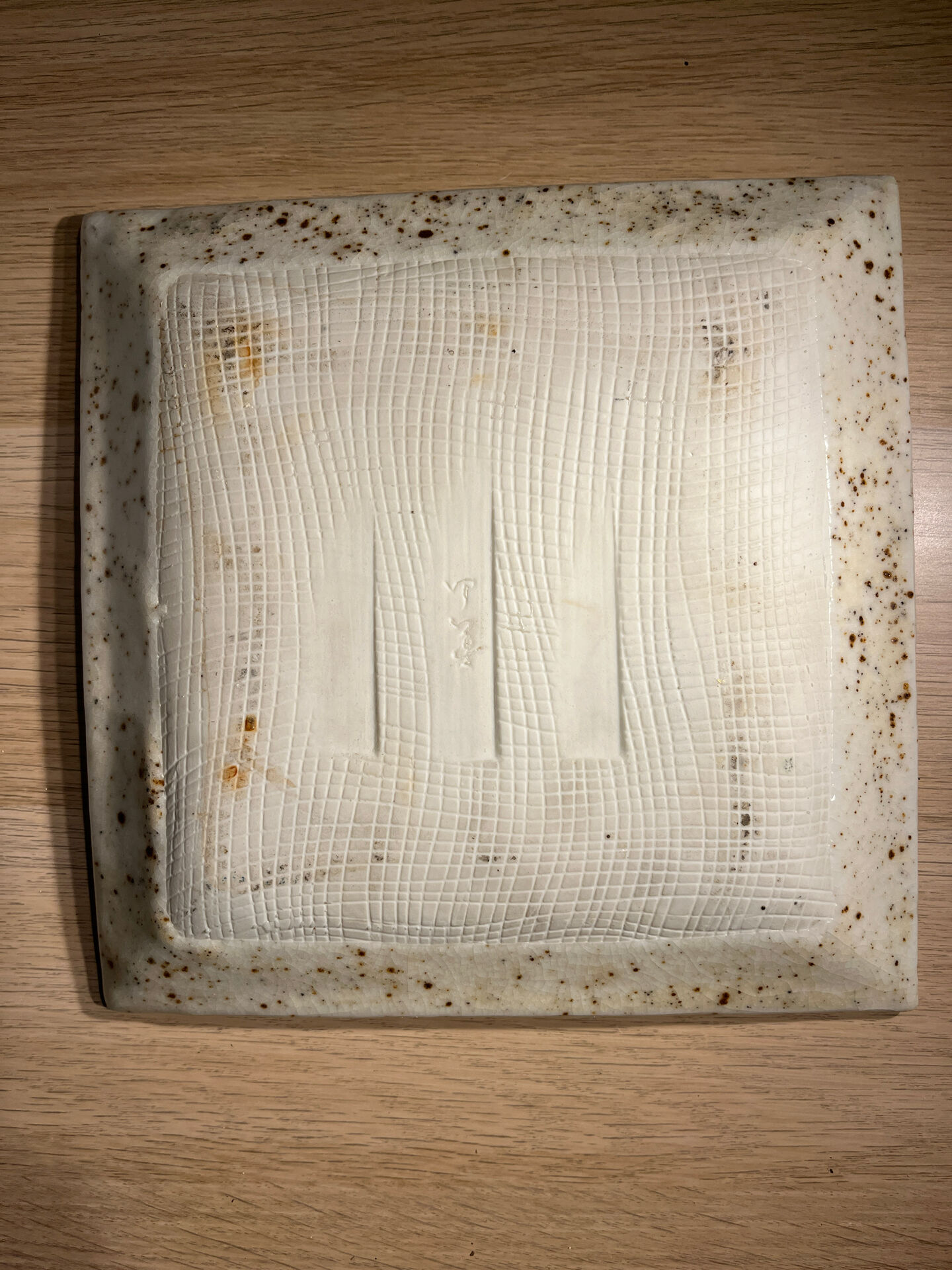 Vintage signed square ceramic plate – speckled cream enamel – 22
