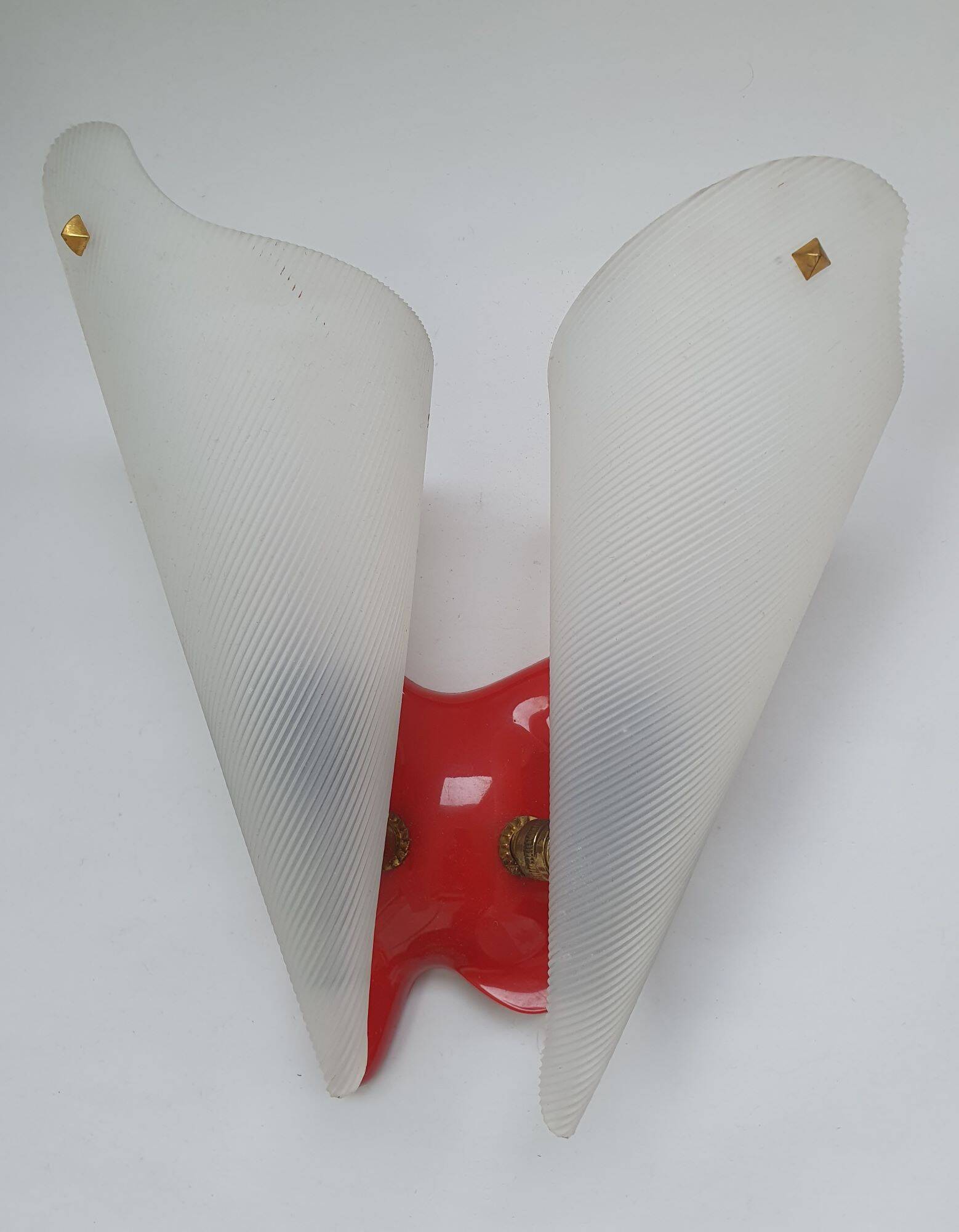 Three vintage rockabilly red plastic wall lights