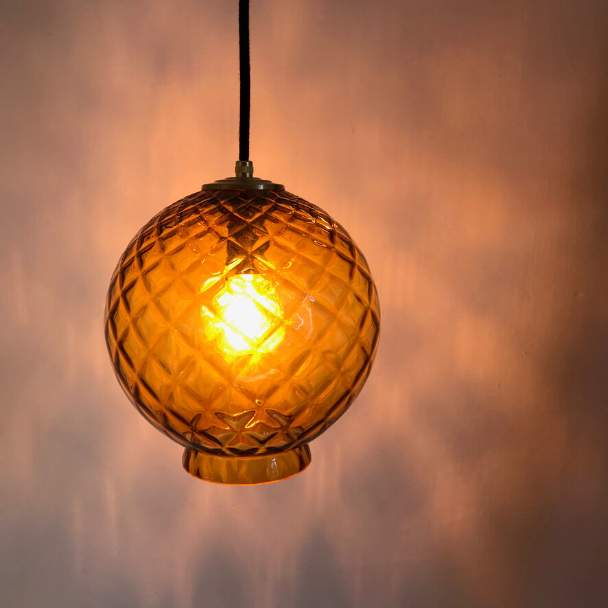 Amber glass globe suspension