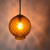 Amber glass globe suspension