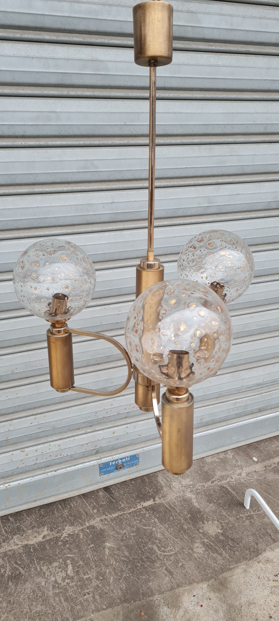 Brass and blown glass chandelier inlaid with gold