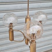 Brass and blown glass chandelier inlaid with gold