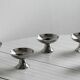 6 silver-plated metal bowls.