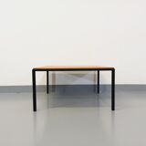Vintage modernist square coffee table in teak and black metal from the 60s