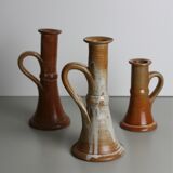 Trio of stoneware candle holders