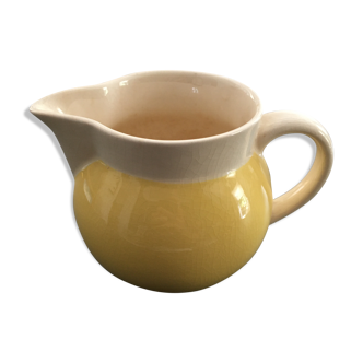 Yellow straw and ivory pitcher