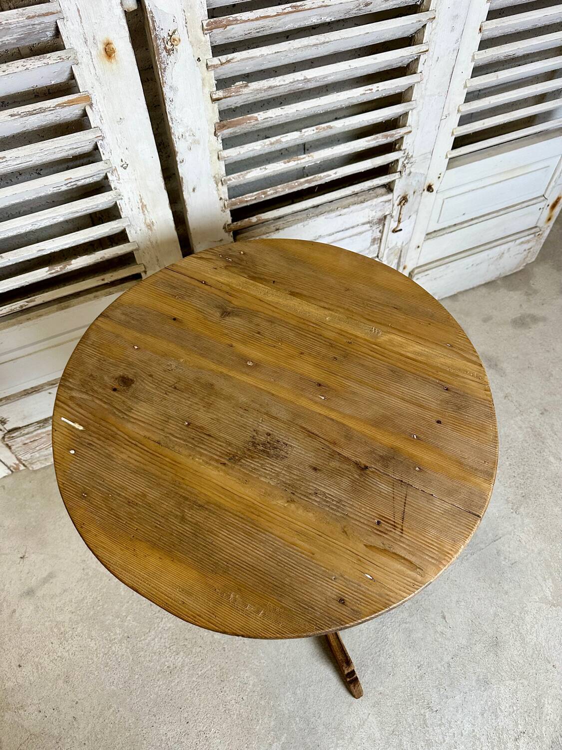 Raw wood pedestal table